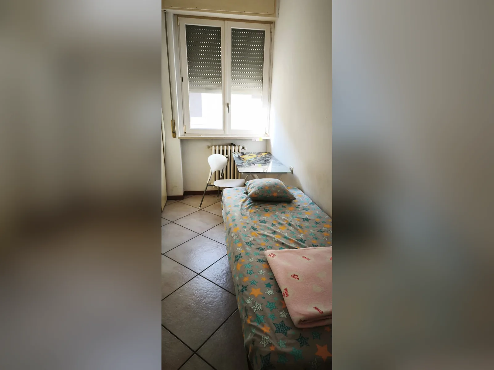 San Pietro Room 3 with a single bed, study desk and bright window